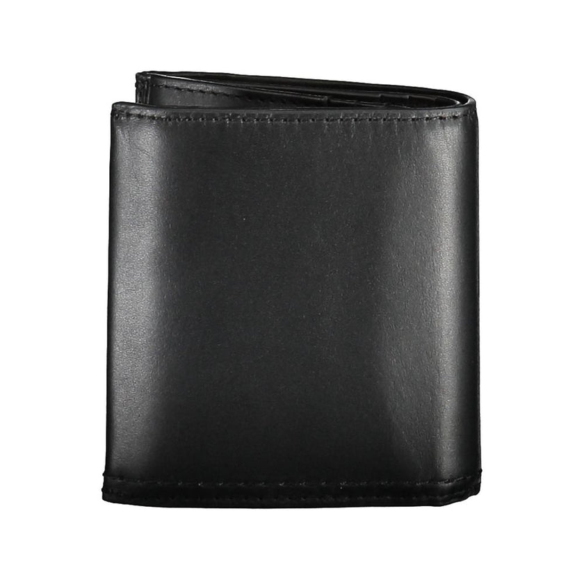Black Leather Men WalletCrafted with the modern gentleman in mind, this Calvin Klein wallet is the epitome of sleek sophistication. A design that resonates with the brand’s minimalist aesthetic, it boasts two spacious compartments, a coin purse tailored f