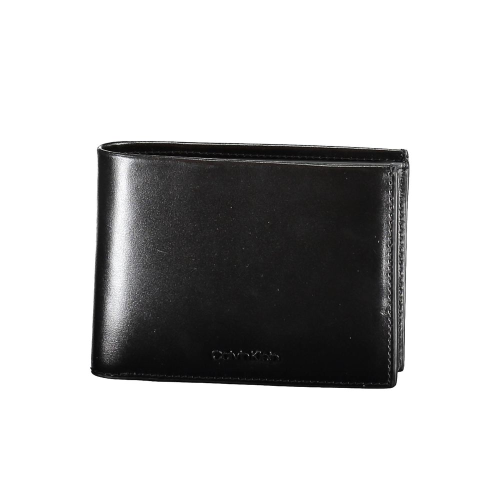 Black Leather Men WalletIndulge in the epitome of sophistication with this Calvin Klein wallet, crafted for the modern man who values security as much as style. It embodies functionality with its dual compartments, a secure coin purse, and ample card slot