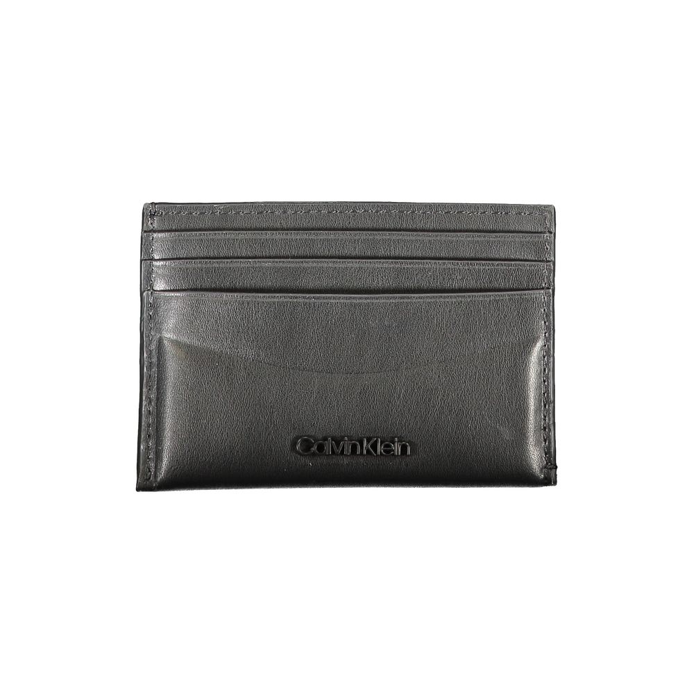 Black Leather WalletCARD HOLDER, DOUBLE SPACES FOR CARD, 1 CENTRAL POCKET, CONTRAST DETAILS, LOGOBlack Leather Wallet${tagsCalvin KleinAulae Black Leather Wallet Calvin KleinAulae Black Leather Wallet CARD HOLDER, DOUBLE SPACES FOR CARD, 1 CENTRAL POCKET,