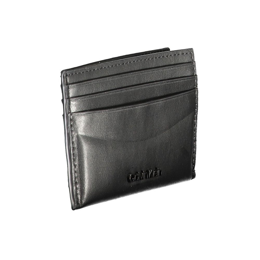 Black Leather WalletCARD HOLDER, DOUBLE SPACES FOR CARD, 1 CENTRAL POCKET, CONTRAST DETAILS, LOGOBlack Leather Wallet${tagsCalvin KleinAulae Black Leather Wallet Calvin KleinAulae Black Leather Wallet CARD HOLDER, DOUBLE SPACES FOR CARD, 1 CENTRAL POCKET,