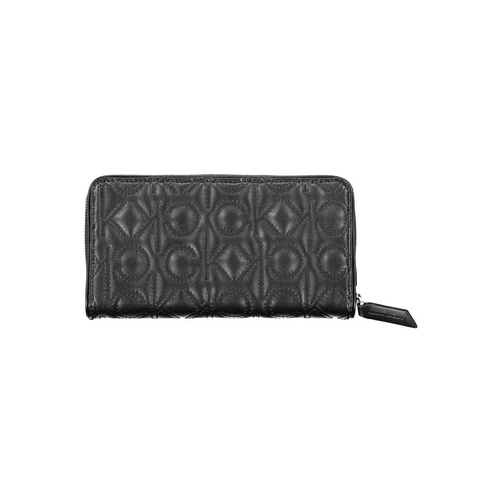 Black Polyethylene Women WalletElevate your essentials with the chic elegance of the Calvin Klein wallet. A testament to minimalist sophistication, this sleek accessory is designed to keep your personal items secure and organized. With five compartments i