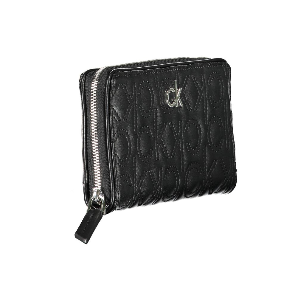 Black Polyethylene Women WalletElevate your essentials with the chic elegance of the Calvin Klein wallet. A testament to minimalist sophistication, this sleek accessory is designed to keep your personal items secure and organized. With five compartments i