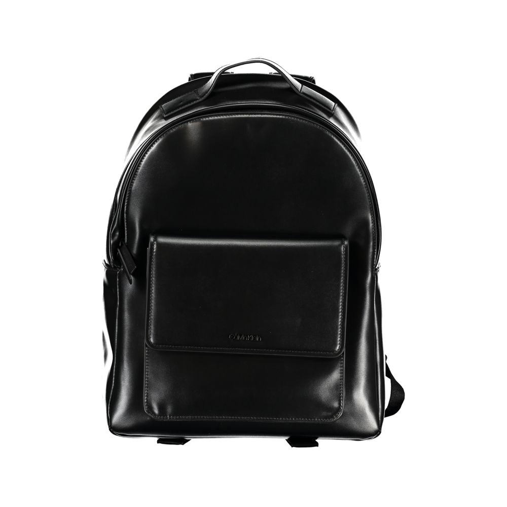 Elegant Black Urban Backpack with Laptop CompartmentUpgrade your accessory game with the Calvin Klein Backpack, tailored for the modern urbanite. This stylish backpack features a convenient single handle design, adjustable straps for personalized comfort,
