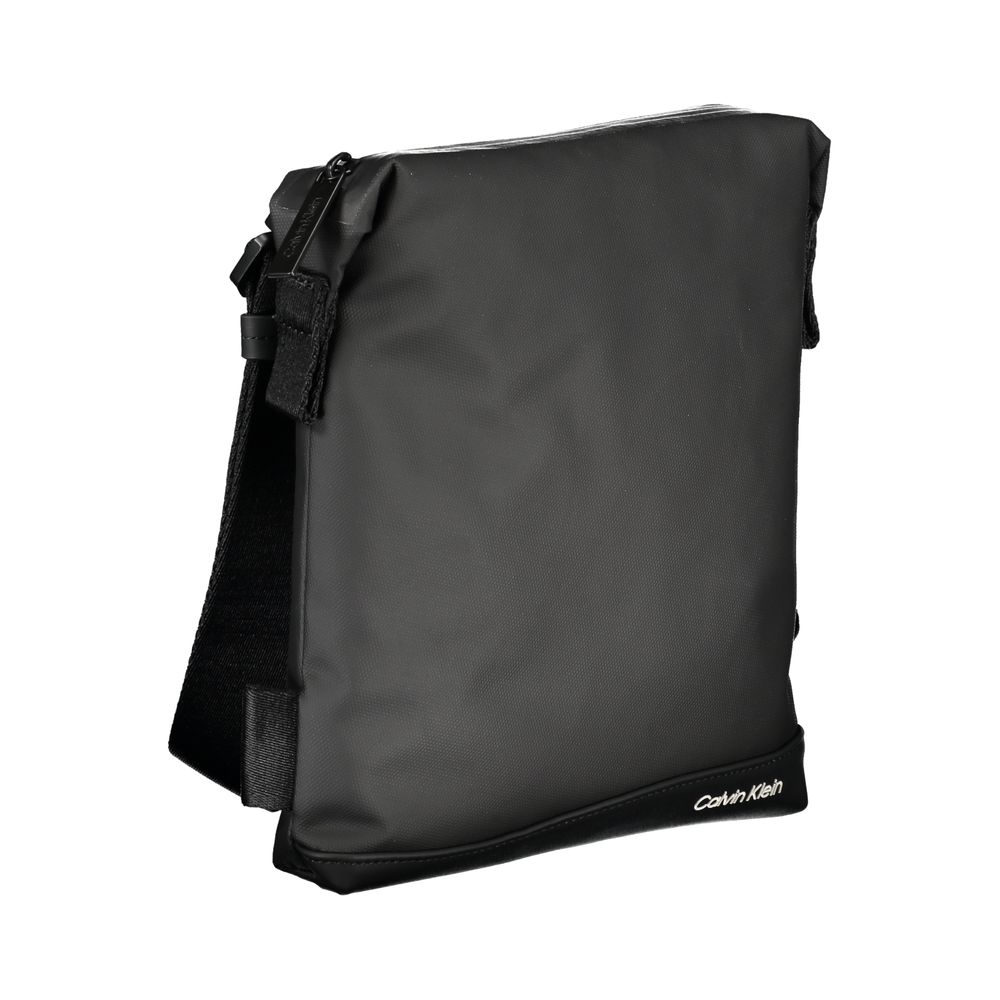 Elegant Black Shoulder Bag with Contrast DetailsDiscover the perfect blend of sophistication and practicality with this elegant, black shoulder bag from Calvin Klein. The adjustable shoulder strap ensures a comfortable fit, while the interior pocket keeps