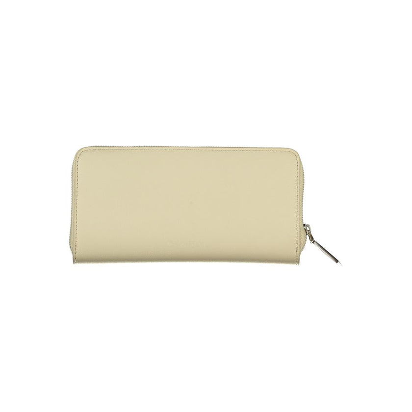 Elegant Beige Zip Wallet with RFID BlockingSecure your essentials in style with this elegant beige wallet featuring a practical design for the modern woman. Boasting RFID blocking technology, this wallet ensures your card data stays safe from unauthorized