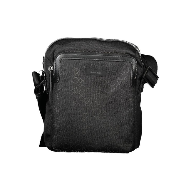 Black Polyester Men Shoulder BagElevate your accessory game with this sleek Calvin Klein shoulder bag. Meticulously crafted from premium materials, it’s designed for the modern man about town. The minimalist black hue is offset by striking contrasting det