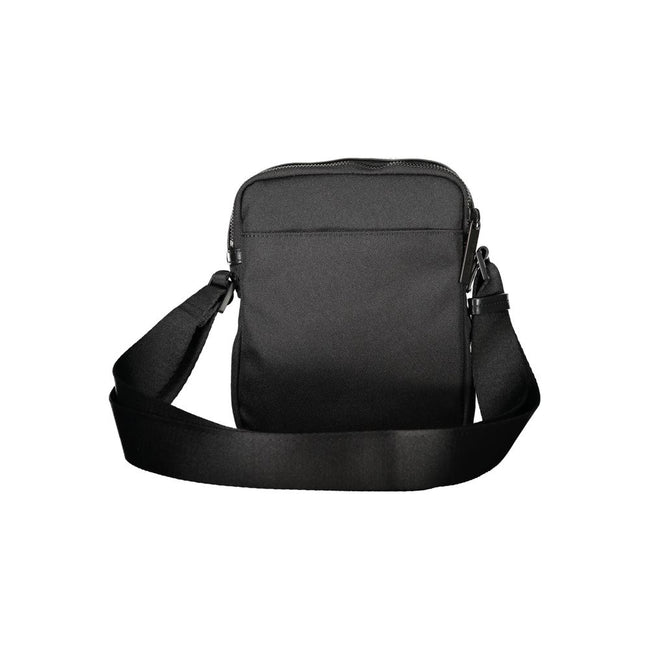 Black Polyester Men Shoulder BagElevate your accessory game with this sleek Calvin Klein shoulder bag. Meticulously crafted from premium materials, it’s designed for the modern man about town. The minimalist black hue is offset by striking contrasting det