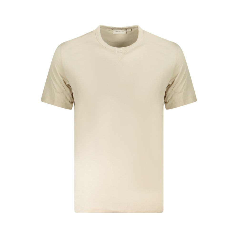 Beige Cotton Men T-ShirtExperience the epitome of sleek fashion with Calvin Klein’s latest creation that seamlessly melds sustainability and style. This short-sleeve T-shirt, with its crisp crew neck and eye-catching contrasting details, showcases the bra