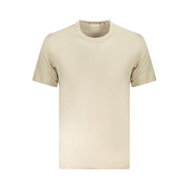 Beige Cotton Men T-ShirtExperience the epitome of sleek fashion with Calvin Klein’s latest creation that seamlessly melds sustainability and style. This short-sleeve T-shirt, with its crisp crew neck and eye-catching contrasting details, showcases the bra