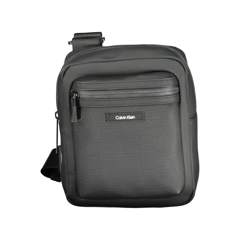 Black Polyester Men Shoulder BagStep out in bold sophistication with this Calvin Klein shoulder bag that effortlessly blends functionality with an edgy style. Designed for the modern individual, it features an adjustable shoulder strap for tailored comfor