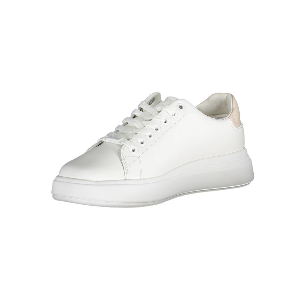 White Leather Women SneakerStep out in elevated style with these Calvin Klein sneakers, where sophistication meets urban chic. Flaunting contrasting details that add a touch of the unexpected, these shoes are emblazoned with the iconic logo, showcasing yo