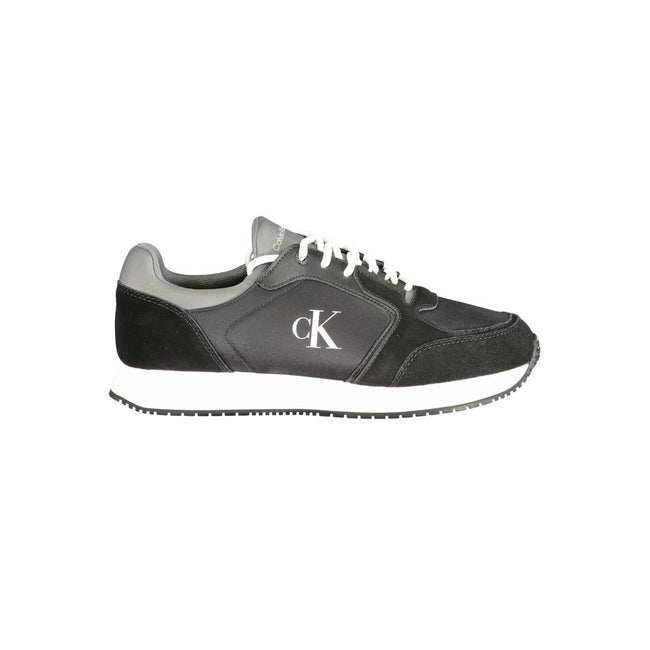 Black Leather Men SneakerElevate your sneaker game with the Calvin Klein edge. Crafted for the modern man, these dynamic sports shoes blend sleek black sophistication with bold contrasting details in grey and white that demand attention. Designed for both