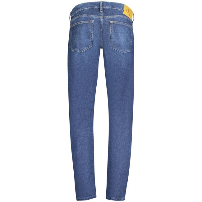 Blue Cotton Men JeanExperience the epitome of contemporary cool with Calvin Klein’s SLIM TAPERED JEANS. Crafted to accentuate your form, these jeans boast a flattering silhouette that’s both sharp and effortless. Detailed with five pockets, a button, and