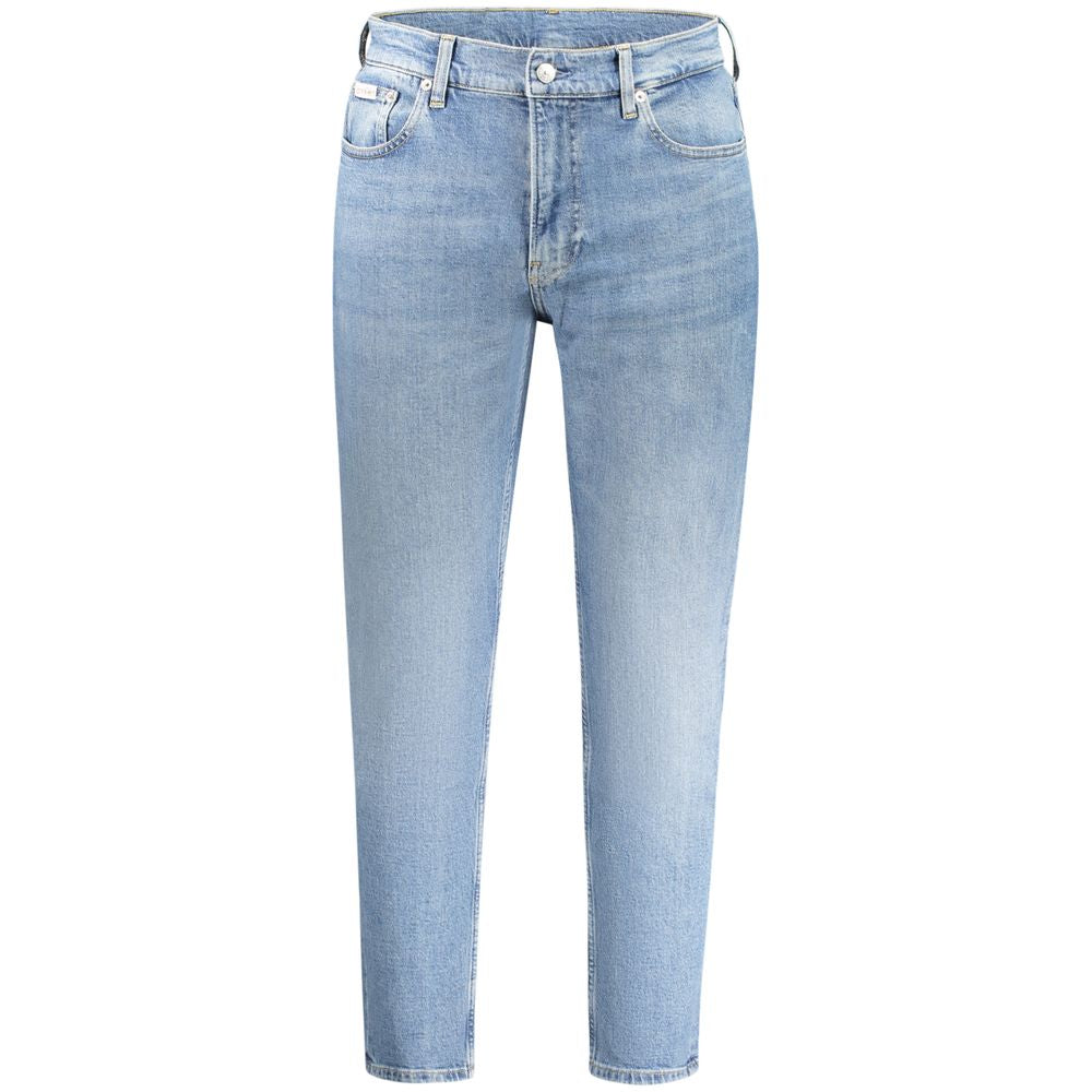 Blue Cotton Men JeansRedefine your denim game with Calvin Klein’s Dad Jeans. Exuding a trendy, washed effect coupled with the classic five-pocket design, these jeans are more than just a style statement; they’re a nod to sustainability with their 20% recy