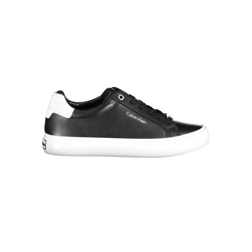Black Leather Women SneakerUnleash confidence with every step in these Calvin Klein sneakers. Exuding urban elegance, they feature bold contrasting details and the iconic logo, signaling a fashionable twist on the athletic staple. Crafted from sustainable