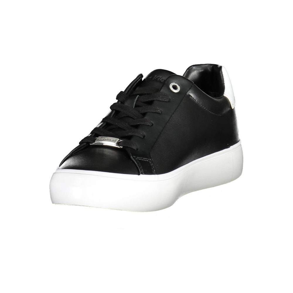 Black Leather Women SneakerUnleash confidence with every step in these Calvin Klein sneakers. Exuding urban elegance, they feature bold contrasting details and the iconic logo, signaling a fashionable twist on the athletic staple. Crafted from sustainable