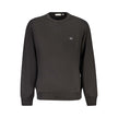 Black Cotton Men SweaterElevate your wardrobe with the unmistakable charm of Calvin Klein. This sleek black long sleeve sweatshirt, crafted from a sumptuous 95% regenerative cotton, promises both comfort and style. The brushed fabric offers a luxurious fe