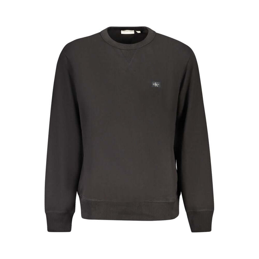 Black Cotton Men SweaterElevate your wardrobe with the unmistakable charm of Calvin Klein. This sleek black long sleeve sweatshirt, crafted from a sumptuous 95% regenerative cotton, promises both comfort and style. The brushed fabric offers a luxurious fe