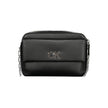 Black Polyester Women HandbagUnleash the epitome of sophistication with Calvin Klein’s latest offering: the quintessential shoulder bag that merges eco-conscious chic with unwavering functionality. Crafted with an eye for detail, it boasts an elegant exte