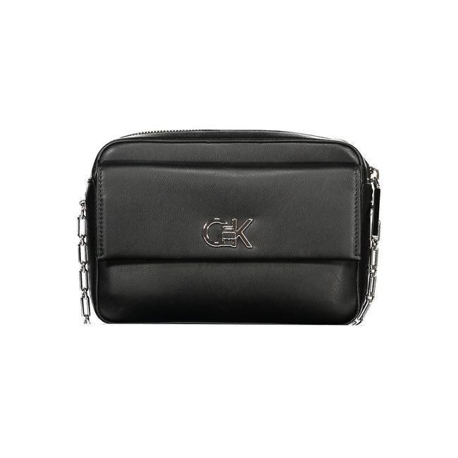 Black Polyester Women HandbagUnleash the epitome of sophistication with Calvin Klein’s latest offering: the quintessential shoulder bag that merges eco-conscious chic with unwavering functionality. Crafted with an eye for detail, it boasts an elegant exte