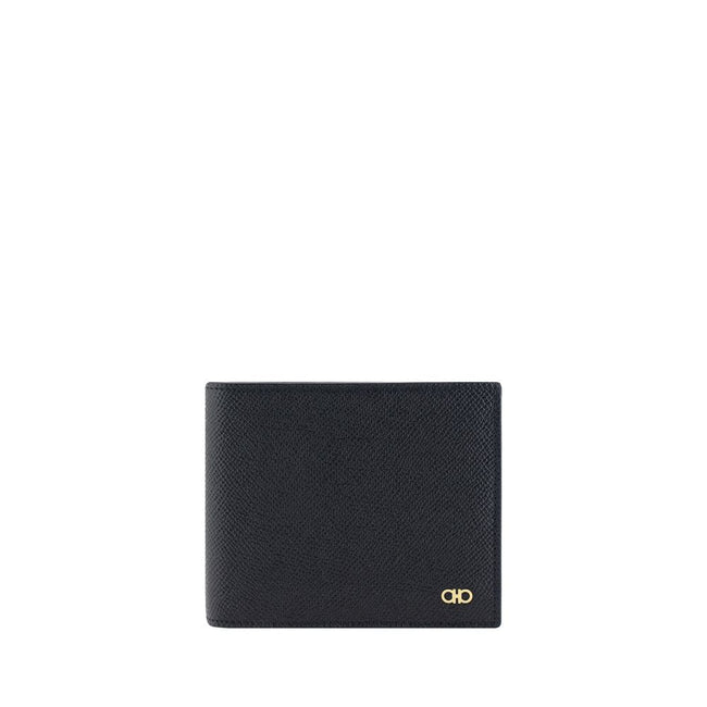 Black Calf Leather Bos Taurus WalletCalfskin Wallet by Ferragamo, billfold model, grained leather design, banknote compartment, interior card slot, iconic brand monogram press-stamped on interior panel, three-dimensional iconic brand Gancini logo plaque a
