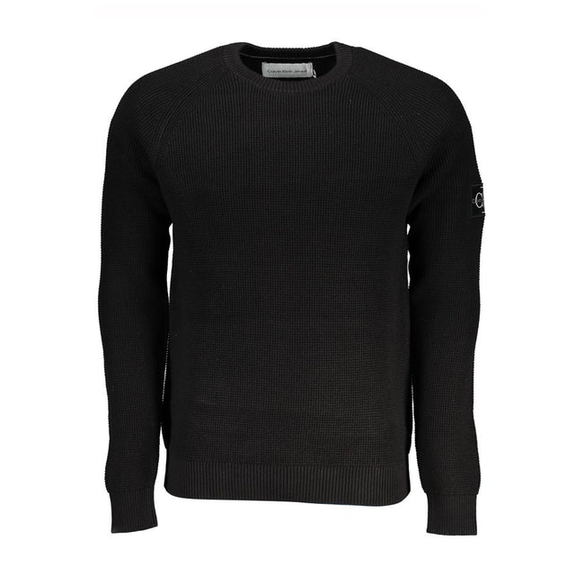 Sleek Organic Cotton Crew Neck SweaterA must-have for the modern man, this Calvin Klein sweater is the embodiment of comfort and style. The long sleeves and classic crew neck design make it a versatile piece for any wardrobe, while the subtle logo applica
