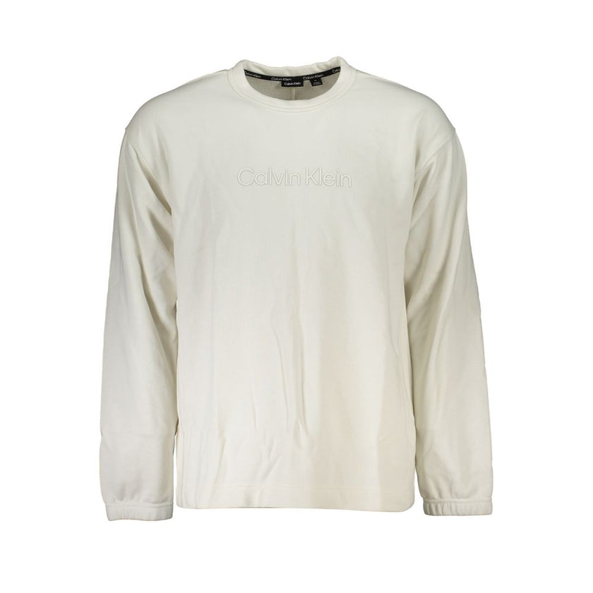 White Cotton Men SweaterElevate your wardrobe with Calvin Klein’s impeccably crafted long-sleeved sweatshirt, radiating a blend of street-savvy flair and comforting warmth. This white crew neck embodies the spirit of sports luxe with its brushed finish an