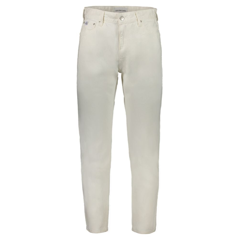 White Cotton Men's JeansElevate your wardrobe with the timeless sophistication of Calvin Klein’s white Dad Jeans. A style that boldly defies trends, these jeans boast a comfortable yet stylish silhouette with classic 5-pocket detailing and a secure button