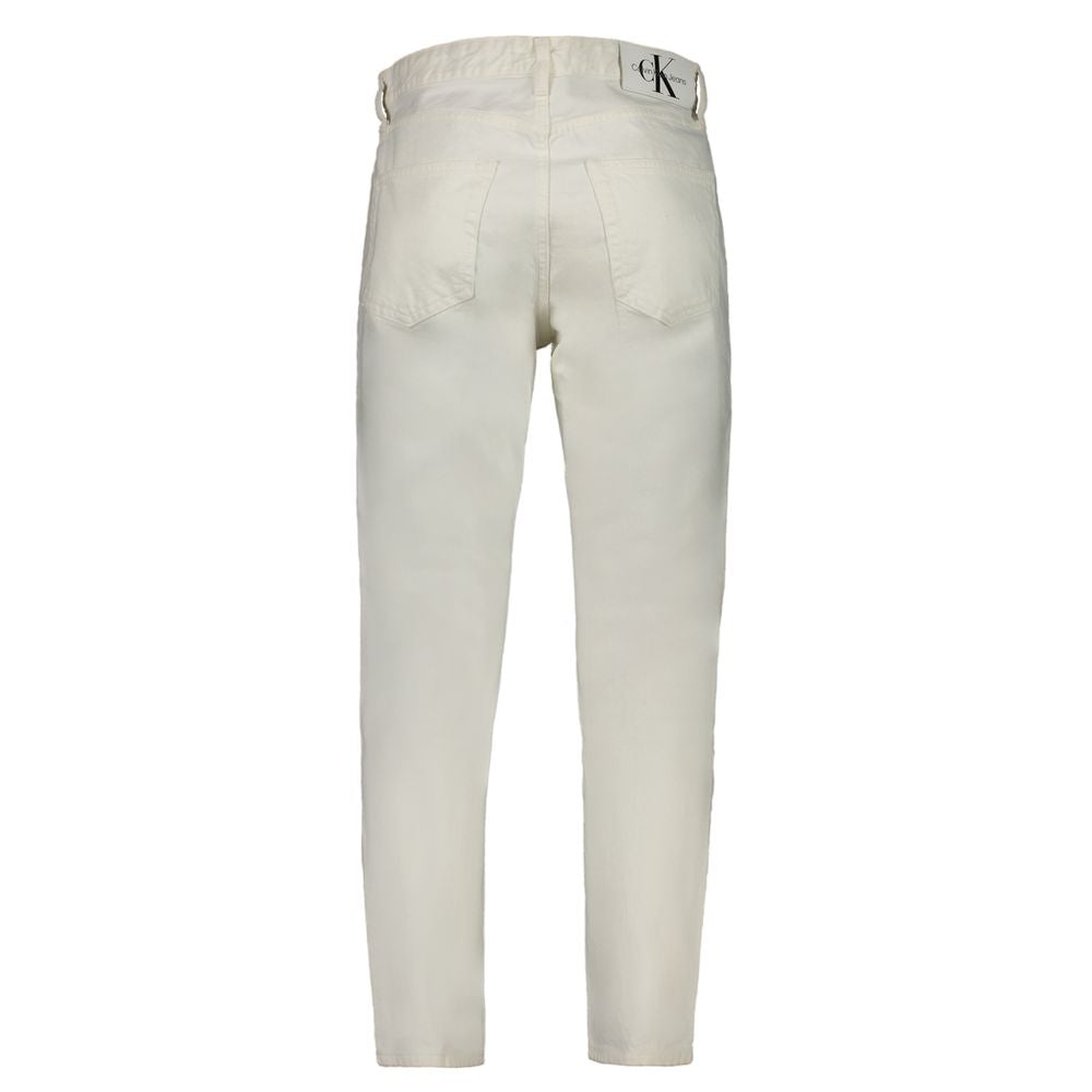 White Cotton Men's JeansElevate your wardrobe with the timeless sophistication of Calvin Klein’s white Dad Jeans. A style that boldly defies trends, these jeans boast a comfortable yet stylish silhouette with classic 5-pocket detailing and a secure button