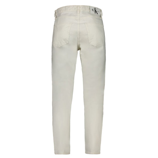 White Cotton Men's JeansElevate your wardrobe with the timeless sophistication of Calvin Klein’s white Dad Jeans. A style that boldly defies trends, these jeans boast a comfortable yet stylish silhouette with classic 5-pocket detailing and a secure button
