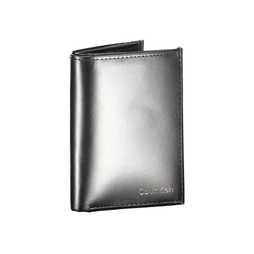 Black Leather WalletWALLET WITH 3 COMPARTMENTS, COIN PURSE, SPACES FOR CARD, RFID BLOCK, PRINT, LOGOBlack Leather Wallet${tagsCalvin KleinAulae Black Leather Wallet Calvin KleinAulae Black Leather Wallet WALLET WITH 3 COMPARTMENTS, COIN PURSE, SPACES FOR
