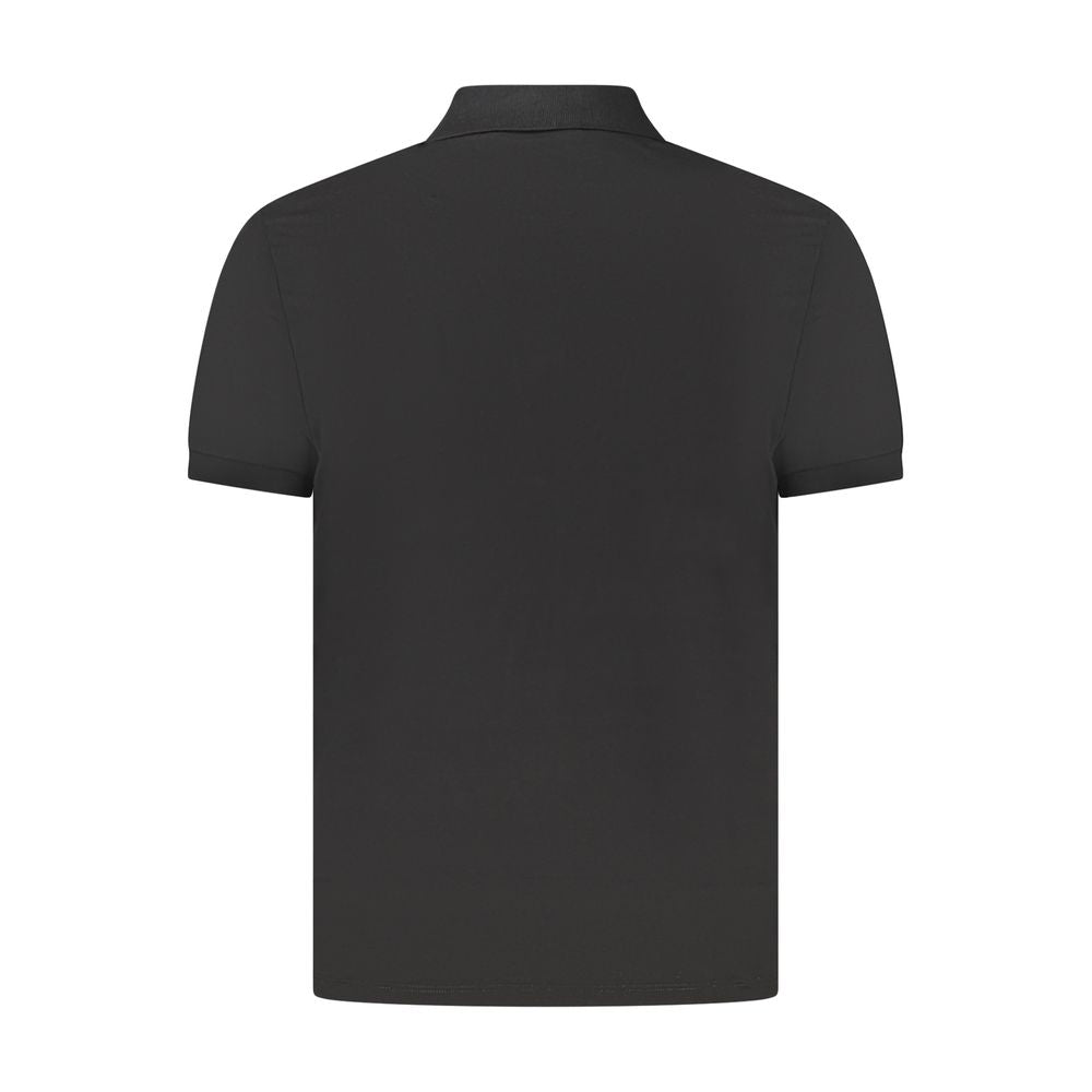 Black Cotton Men Polo ShirtElevate your wardrobe with a touch of sophistication in this Calvin Klein Classic Fit Polo. Crafted for those who demand both comfort and style, this short sleeve polo boasts a sleek black hue, complemented by the iconic Calvin
