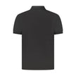 Black Cotton Men Polo ShirtElevate your wardrobe with a touch of sophistication in this Calvin Klein Classic Fit Polo. Crafted for those who demand both comfort and style, this short sleeve polo boasts a sleek black hue, complemented by the iconic Calvin