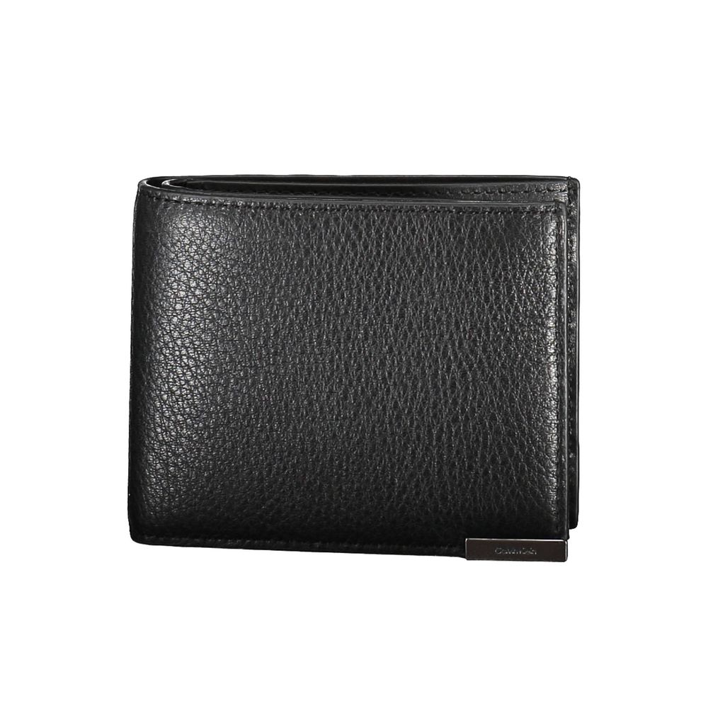 Black Leather Men WalletEmbark on your next journey with a dash of sophistication and security. This Calvin Klein wallet is not just an accessory; it’s a statement. Crafted in sumptuous leather, it features a sleek design that includes two spacious compar