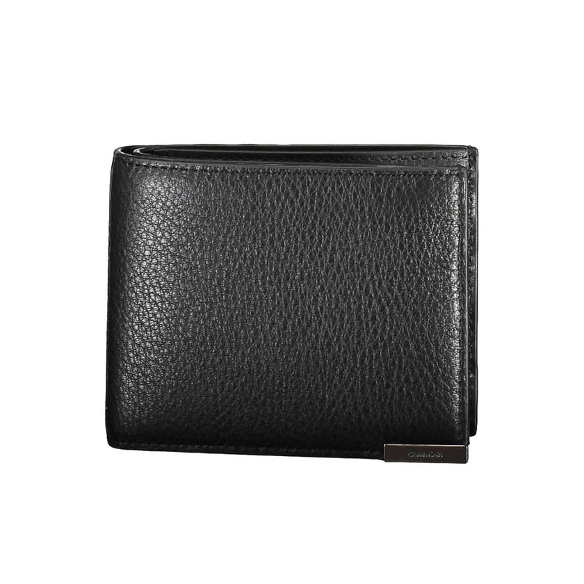Black Leather Men WalletEmbark on your next journey with a dash of sophistication and security. This Calvin Klein wallet is not just an accessory; it’s a statement. Crafted in sumptuous leather, it features a sleek design that includes two spacious compar