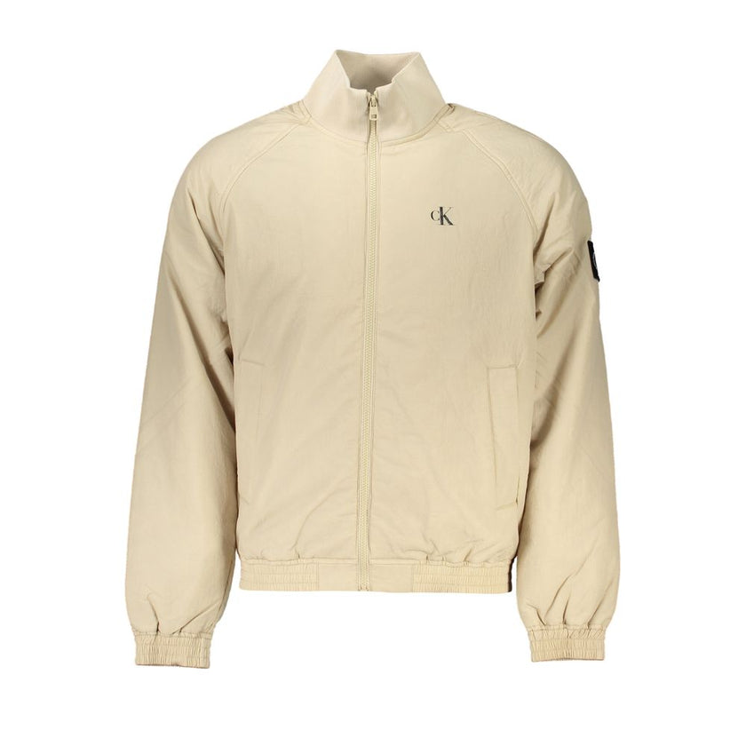 Beige Polyamide Men JacketDare to stand out with the unmistakable allure of Calvin Klein. This beige long-sleeve jacket isn’t just a statement of style, it’s a commitment to sustainability with its recycled fabric. Adorned with a striking print and the ic