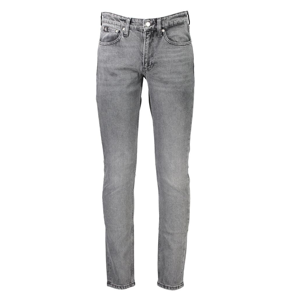 Gray Cotton Men JeansStep into the epitome of sleek sophistication with Calvin Klein’s Slim Taper Jeans. Perfectly engineered to blend style with comfort, these jeans boast an unmatched fit that’s both contemporary and timeless. Made for the modern trends