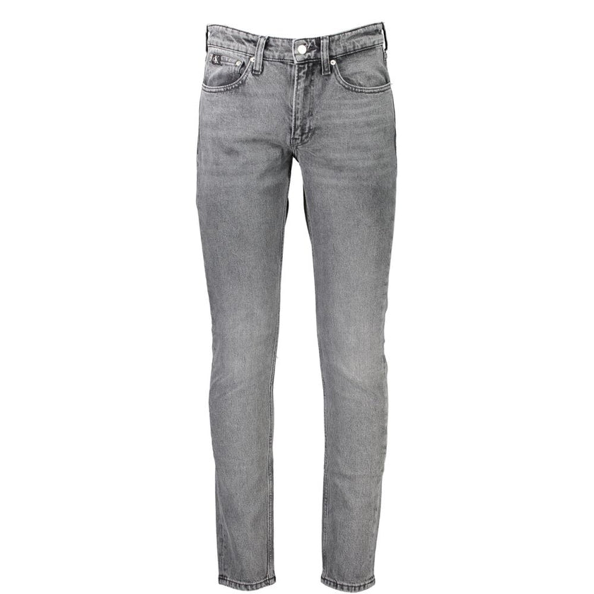 Gray Cotton Men JeansStep into the epitome of sleek sophistication with Calvin Klein’s Slim Taper Jeans. Perfectly engineered to blend style with comfort, these jeans boast an unmatched fit that’s both contemporary and timeless. Made for the modern trends