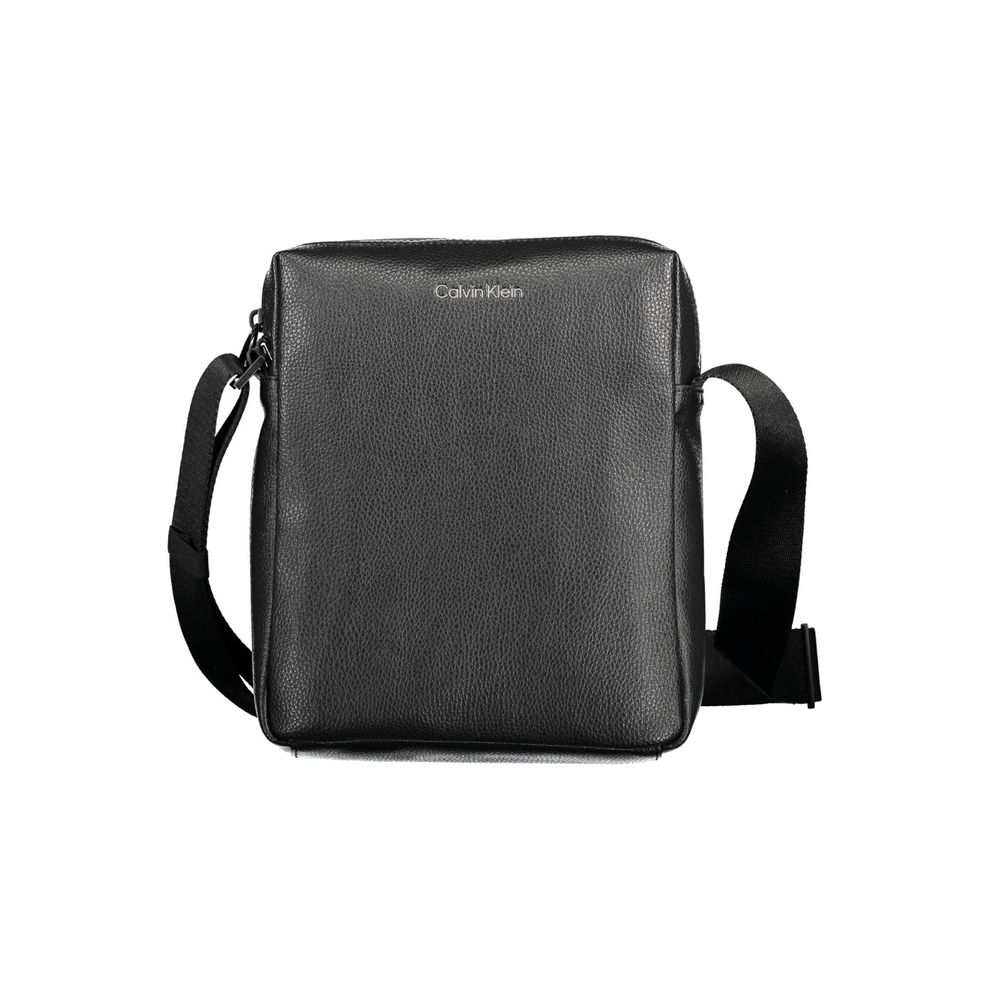Black Polyester Men Shoulder BagStep into the world of sustainable luxury with this Calvin Klein shoulder bag, crafted for the modern man with an eco-conscious heart. This sleek black bag boasts a design as practical as it is environmentally friendly, wit