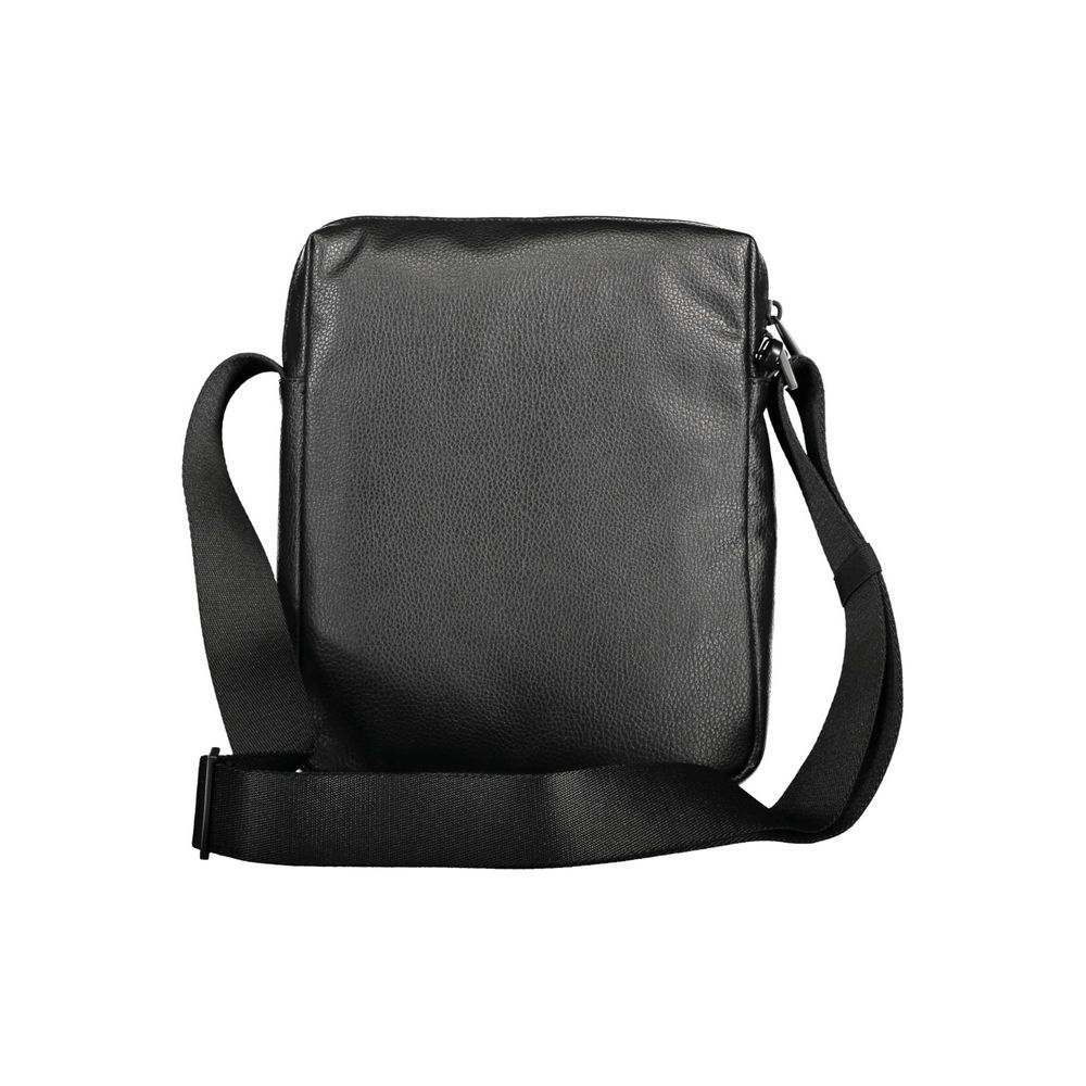 Black Polyester Men Shoulder BagStep into the world of sustainable luxury with this Calvin Klein shoulder bag, crafted for the modern man with an eco-conscious heart. This sleek black bag boasts a design as practical as it is environmentally friendly, wit
