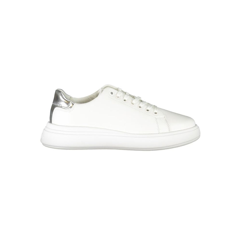 Chic White Sneakers with Contrast DetailsStep into sustainable style with Calvin Klein’s sporty footwear. Designed for the eco-conscious fashionista, these sneakers feature laces, contrast details, and the iconic logo on 50% recycled leather, offering bot