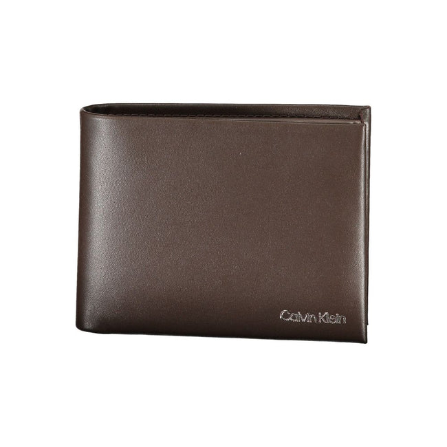 Elegant Leather Wallet with RFID BlockExperience sophistication with the Calvin Klein wallet, your essential companion for every occasion. Crafted from 100% premium leather, this wallet features two main compartments, a practical coin purse, and multiple