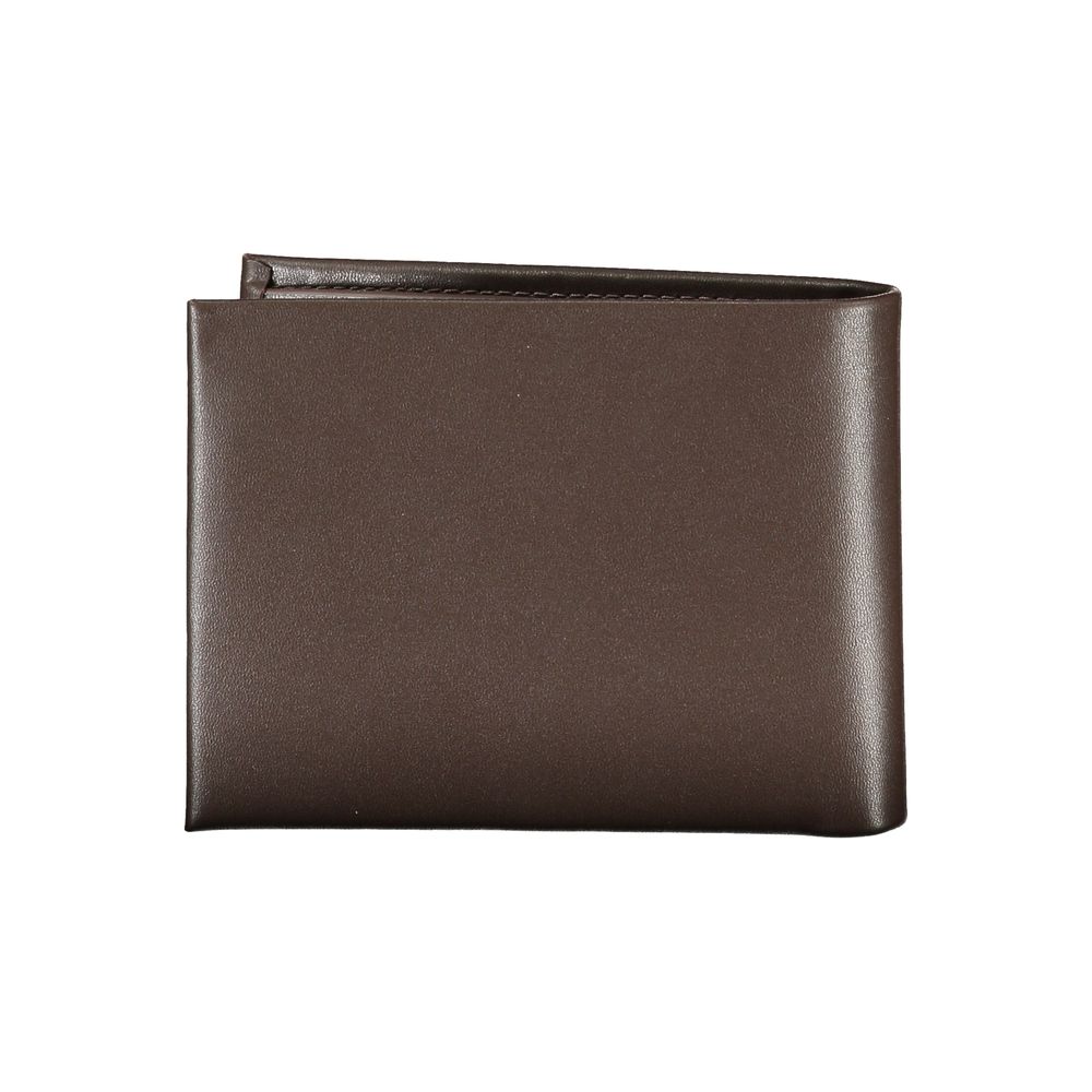 Elegant Leather Wallet with RFID BlockExperience sophistication with the Calvin Klein wallet, your essential companion for every occasion. Crafted from 100% premium leather, this wallet features two main compartments, a practical coin purse, and multiple