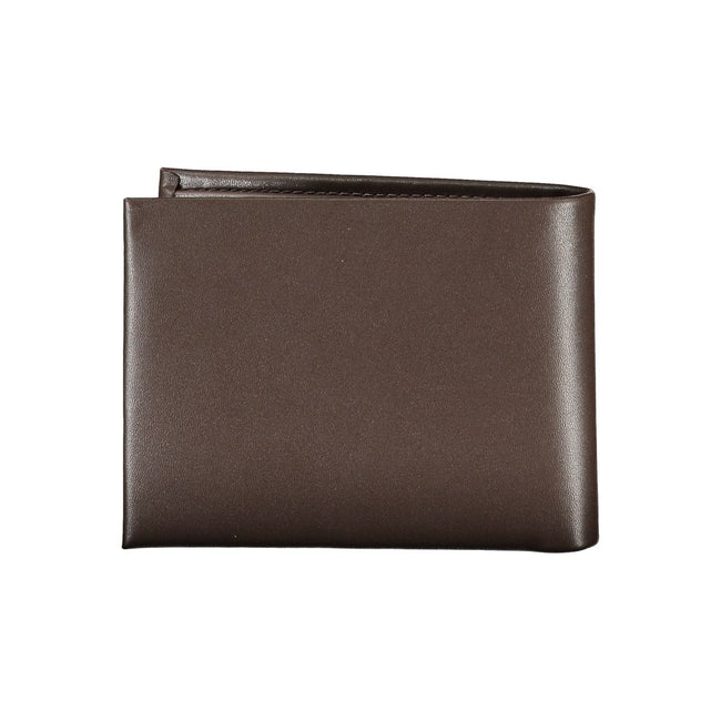 Elegant Leather Wallet with RFID BlockExperience sophistication with the Calvin Klein wallet, your essential companion for every occasion. Crafted from 100% premium leather, this wallet features two main compartments, a practical coin purse, and multiple