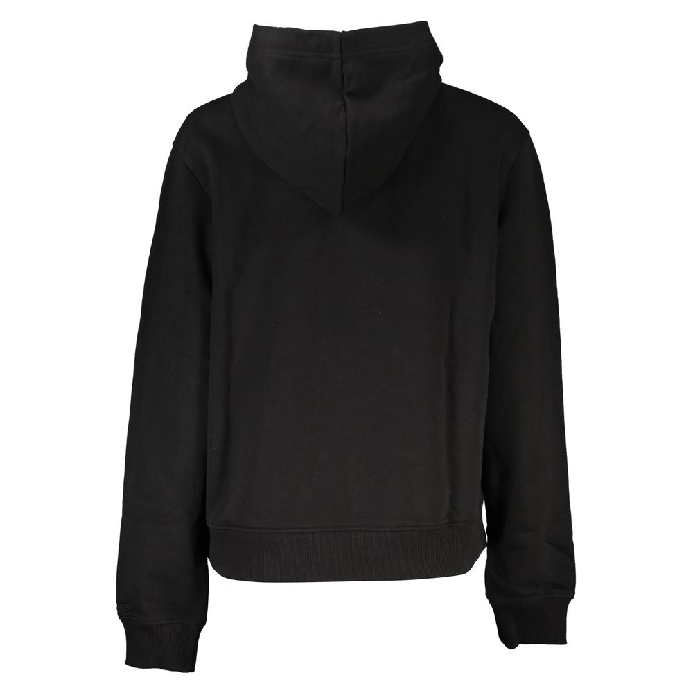 Black Cotton Women SweaterIndulge in the epitome of cozy-chic with Calvin Klein’s sleek long-sleeved sweatshirt. Crafted from a sustainable blend of regenerative cotton, this hooded marvel isn’t just a style statement—it’s an eco-conscious choice. Adorned