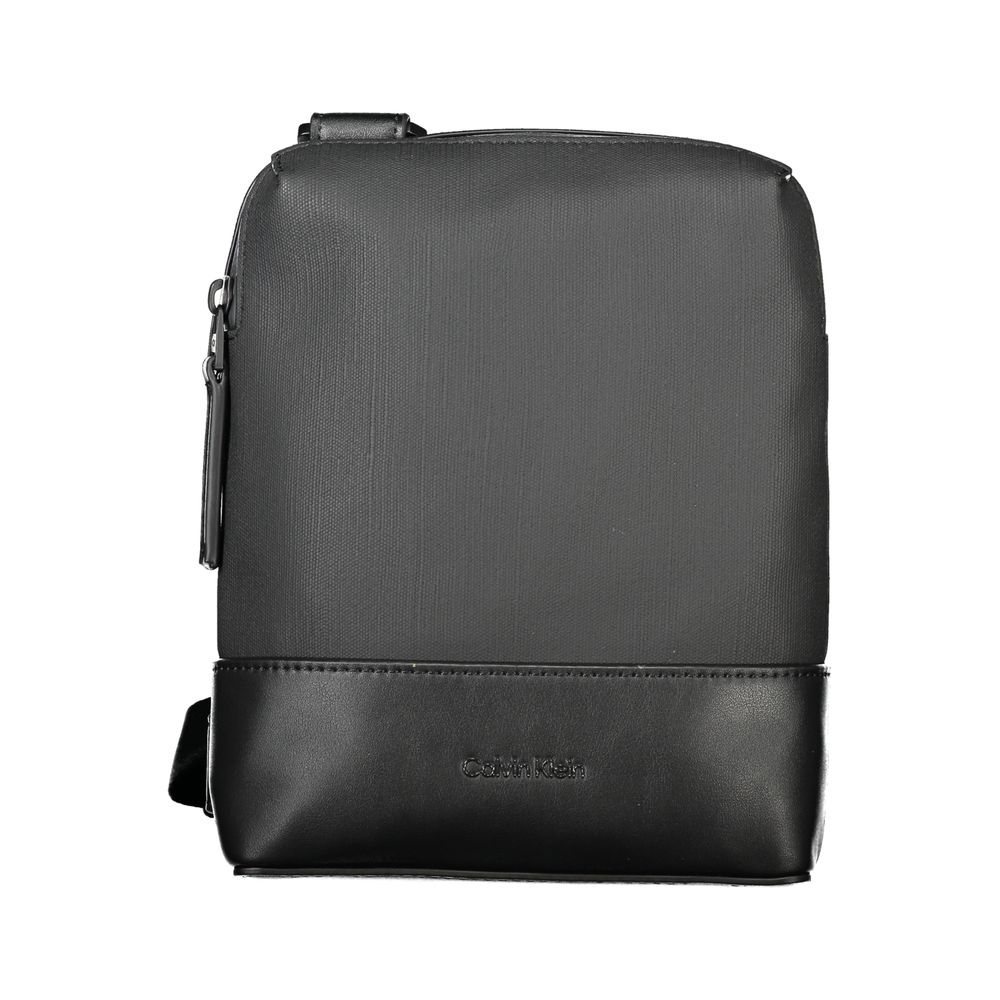 Black Polyester Men Shoulder BagExude confidence and style with this sleek Calvin Klein shoulder bag—an investment in your daily arsenal. Crafted for the modern man on the move, this accessory boasts practicality without sacrificing its urbane appeal. Wit