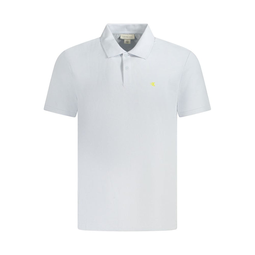 Light Blue Cotton Men Polo ShirtElevate your wardrobe with the timeless sophistication of Calvin Klein. This classic fit polo, tailored from premium cotton, is a perfect harmony of comfort and style. The Light Blue hue complements the subtle elegance with