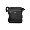 Black Polyester Men Shoulder BagElevate your accessory game with the sophisticated edge of a Calvin Klein shoulder bag, the perfect blend of functionality and sleek style. Boasting adjustable straps for a custom fit, this bag features two convenient exter