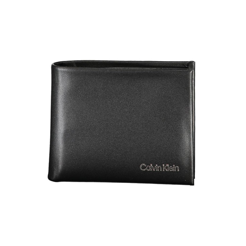 Black Polyester Men WalletEmbrace the epitome of sleek sophistication with this Calvin Klein RFID-blocking wallet. Engineered to secure your essentials with its dual card compartments, it’s more than just an accessory; it’s a statement. Practical yet poli