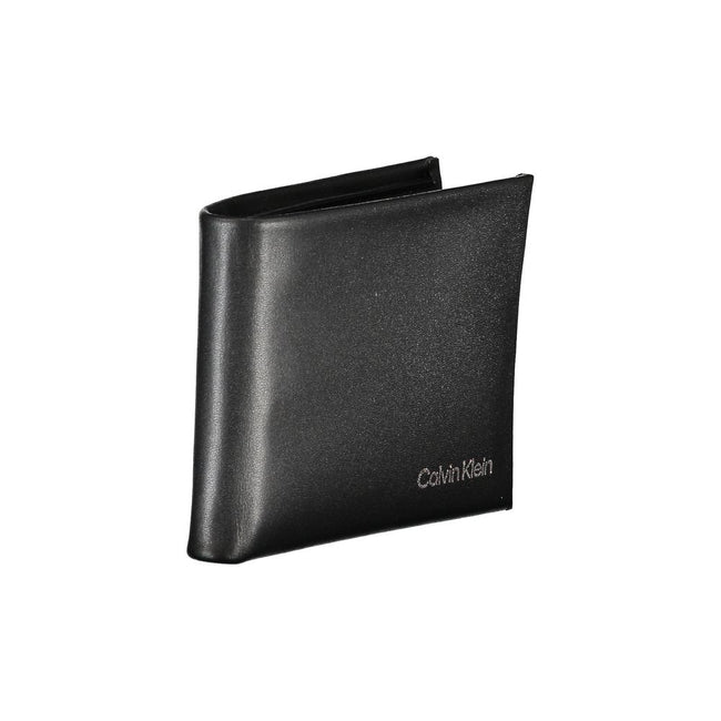 Black Polyester Men WalletEmbrace the epitome of sleek sophistication with this Calvin Klein RFID-blocking wallet. Engineered to secure your essentials with its dual card compartments, it’s more than just an accessory; it’s a statement. Practical yet poli